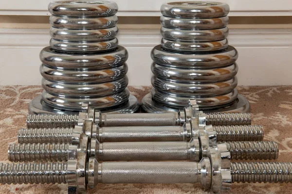 Close up of weight lifting equipment on the floor at home