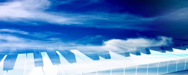 Klaviertastatur Banner mit Himmel Elementen als Hintergrund