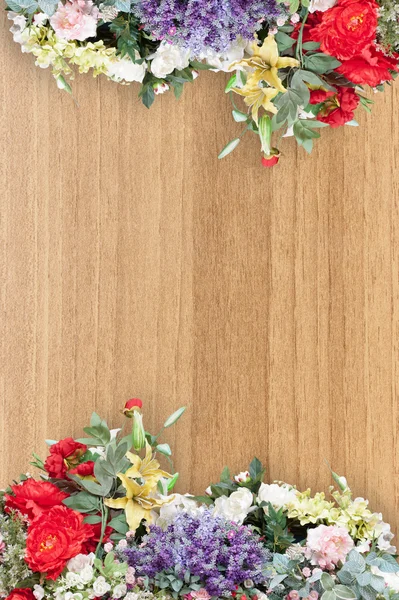 Flowers on wooden background — Stock Photo, Image