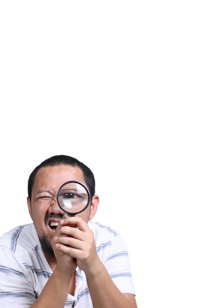 Man with magnifying glass — Stock Photo, Image