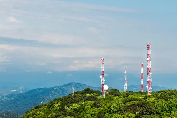 Communication antenna on a hill Stock Image