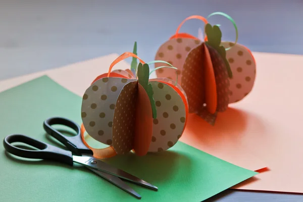 Paper pumpkin with scissors — Stock Photo, Image