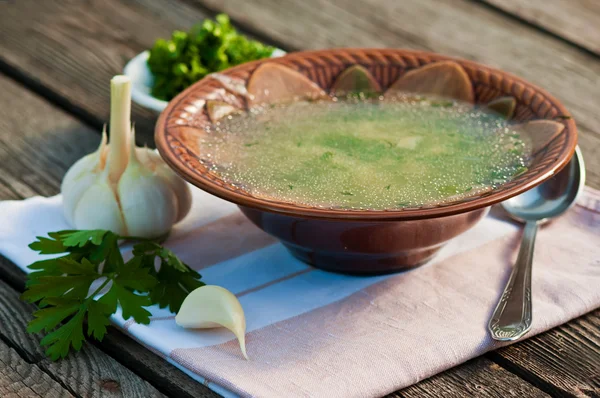 Delicious fresh soup on wodeen background — Stock Image Delicious fresh soup on wodeen background Stock Photo