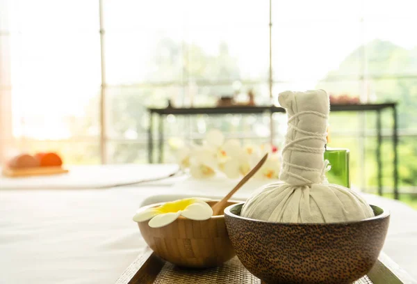 Herbal compress ball with coconut shell spa aroma flowers products skincare. Thai herb massage therapy beauty salon relaxation luxury resort-concept.