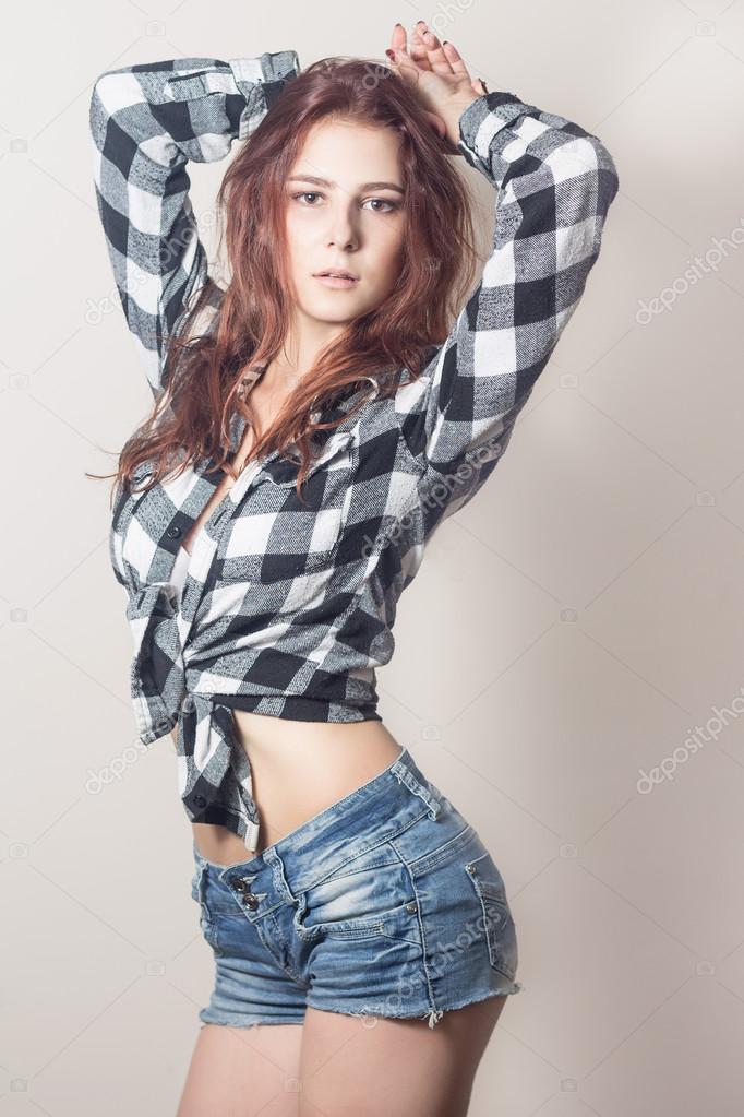 Pretty girl in a plaid shirt