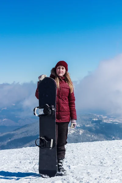 Lány a snowboard-hegység — Stock Fotó