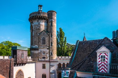 Tower and roofs of Franzensburg castle in Laxenburg, Austria clipart