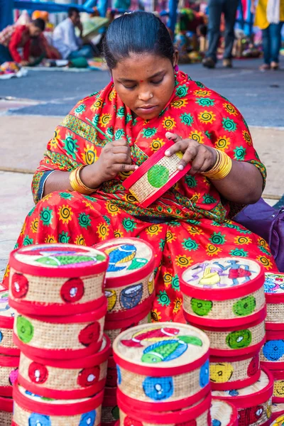 Artist works on handicraft items — Stock Photo, Image