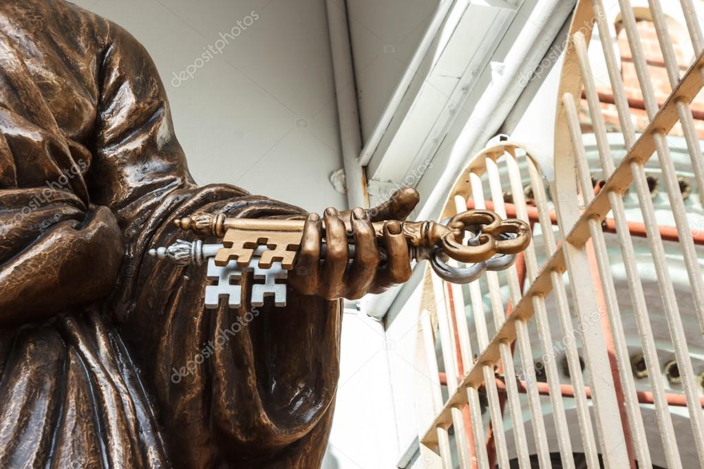The keys of heaven in Saint Peter hand. Statue in front of Assumption Cathedral, Bangkok Thailand