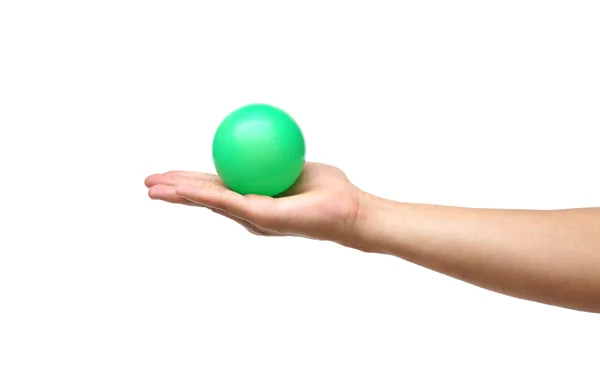 Hand som håller en boll — Stockfoto