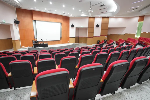 Red chairs in auditorium — Stock Photo, Image