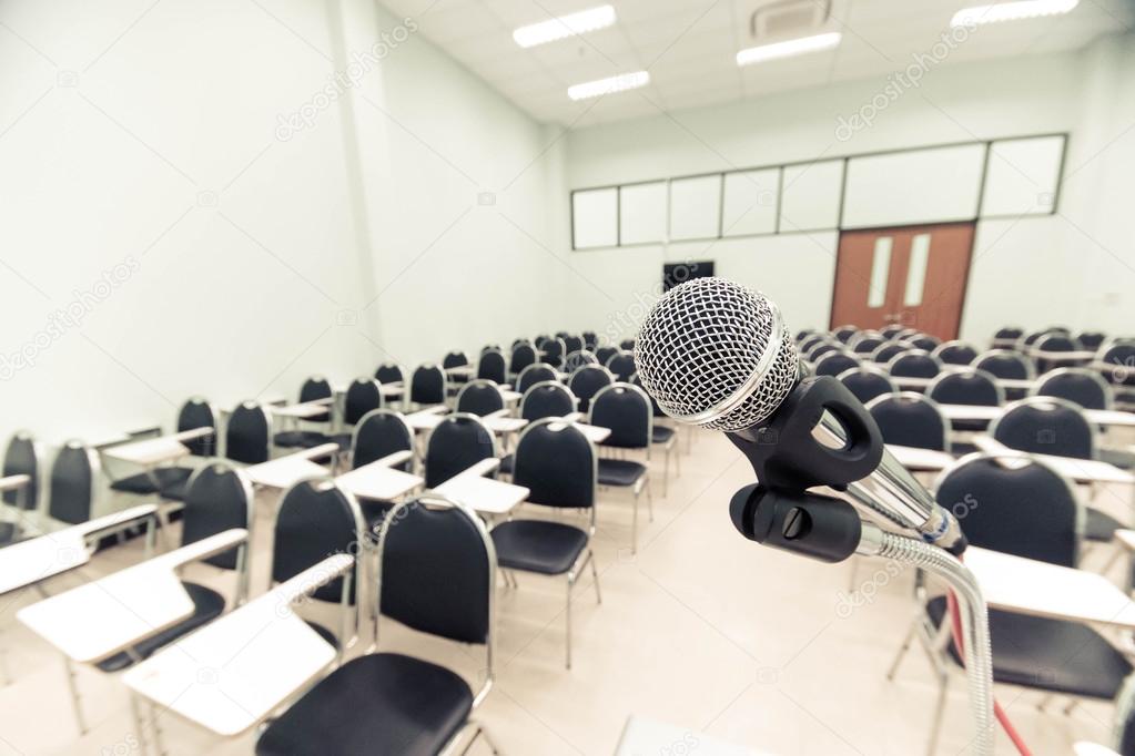 A microphone in empty classroom Stock Photo by ©weerapat 108495046
