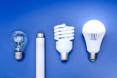 Old and new generation of light bulbs clipart