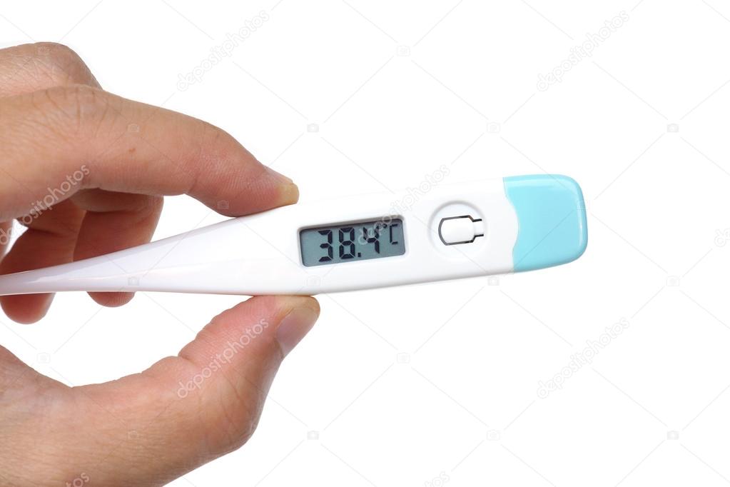 hand holding a thermometer