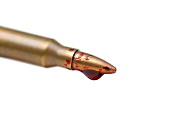 A rifle bullet with red blood — Stock Photo, Image