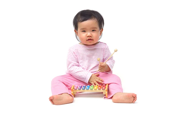 Baby playing with xylophone — Stock Photo, Image