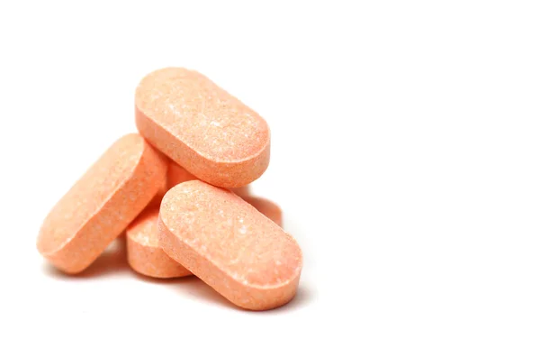 Comprimidos de vitamina C isolados — Fotografia de Stock