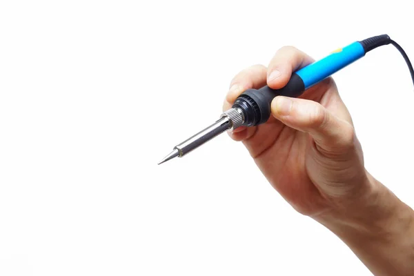 Hand Hält Ein Lötwerkzeug Isoliert Auf Weißem Hintergrund lizenzfreie Stockfotos