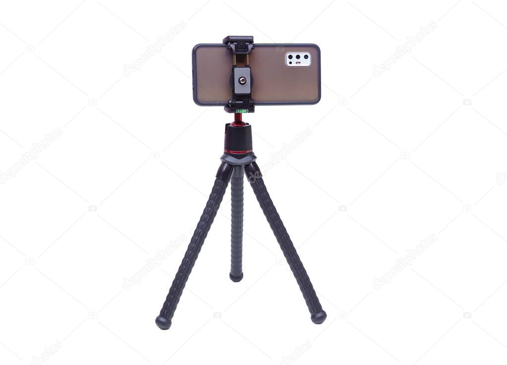 A smart phone on a tripod isolated on white background