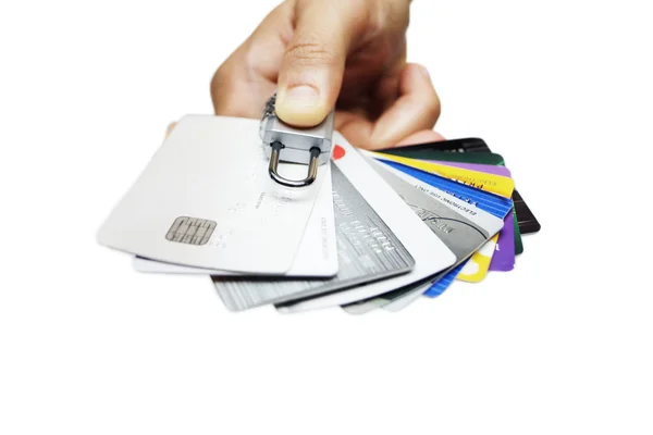 Mão segurando cartões de crédito com bloqueio — Fotografia de Stock