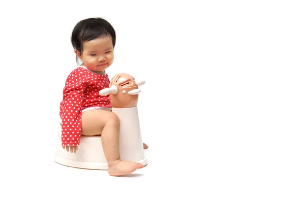 Asian baby playing with toilet — Stock Photo, Image