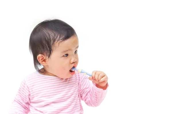 Asian baby brush teeth — Stock Photo, Image