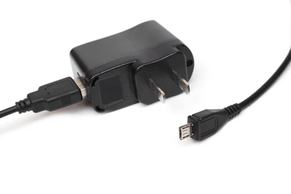 Adapter Ladegerät auf weiß — Stockfoto