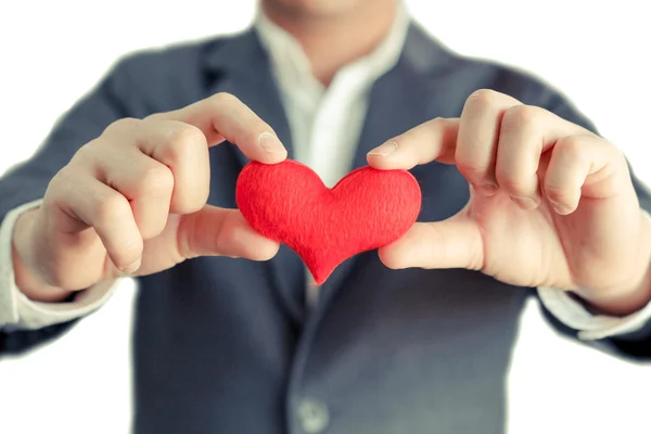 Empresario da un corazón rojo — Foto de Stock