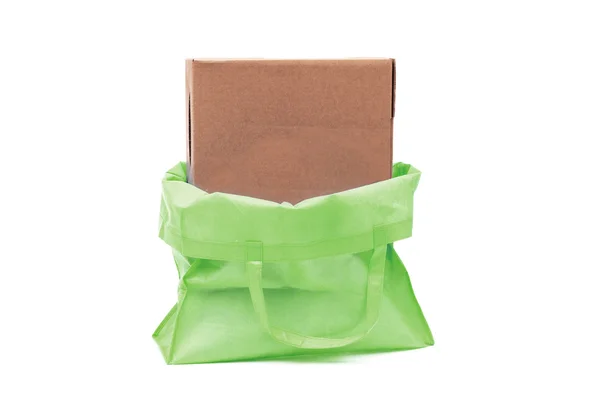 Boîte en carton dans un sac en tissu — Photo