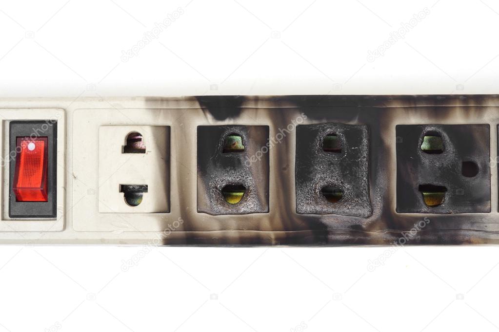 Burnt surge protector on white