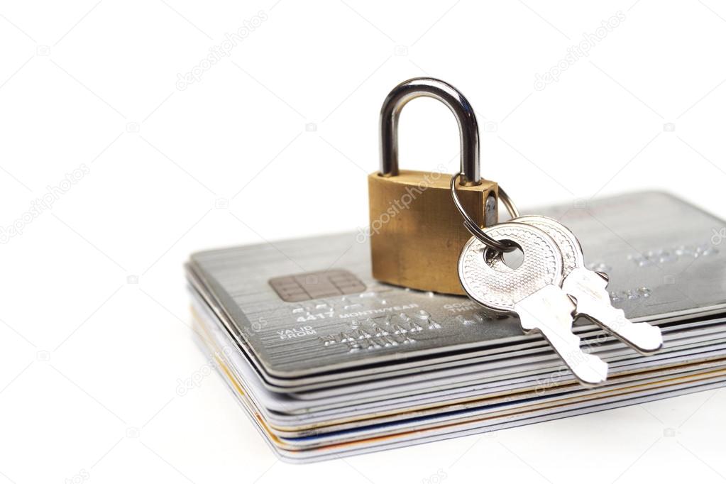 Credit cards under lock with keys