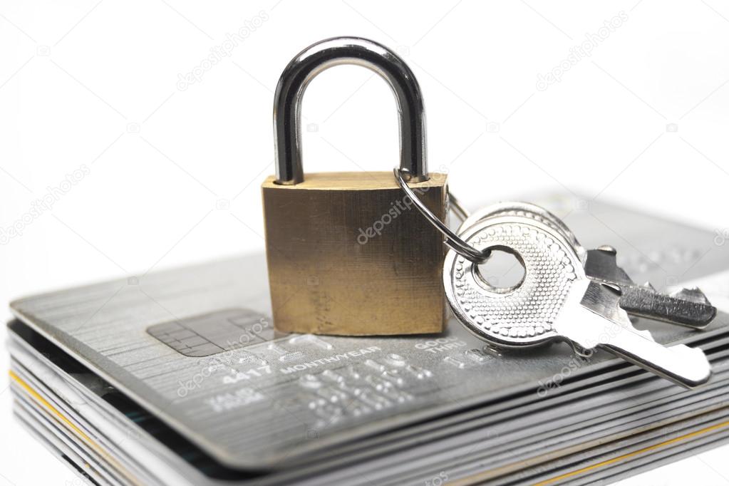 Credit cards under lock with keys