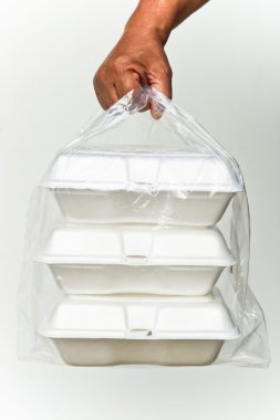 holding a clear plastic bags clipart