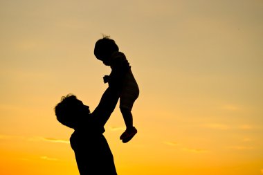 Baba ve onun oğlu siluet