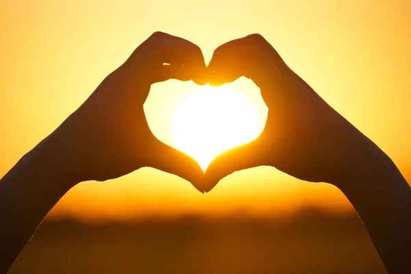 Heart symbol made with two hands — Stock Photo, Image