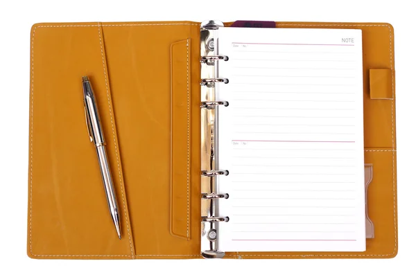 Open notebook with a pen — Stock Photo, Image