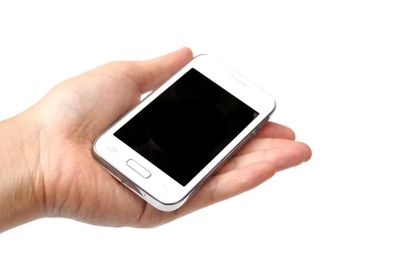 Hände, die ein weißes Smartphone halten — Stockfoto