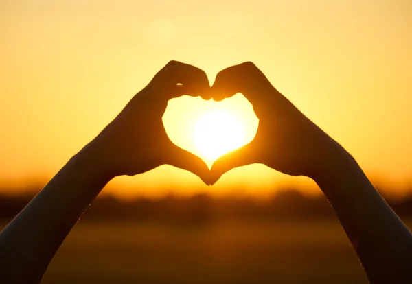 Heart symbol made with two hands — Stock Photo, Image