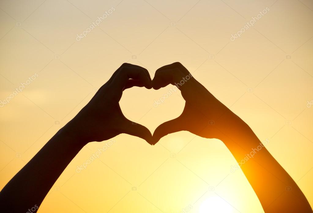 Heart symbol made with two hands — Stock Photo © weerapat Heart symbol made with two hands — Stock Photo © weerapat
