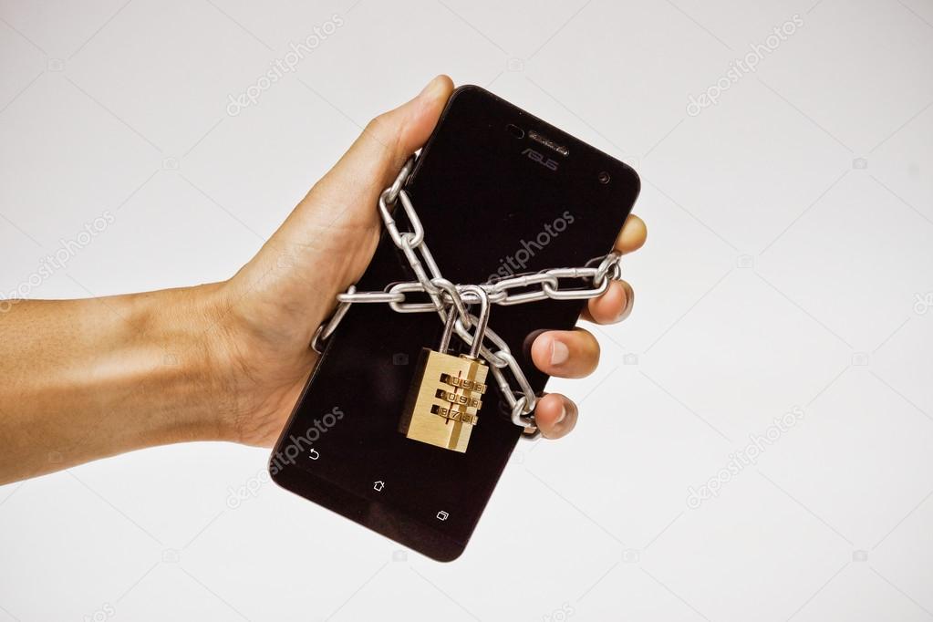 hand holding a chained smartphone