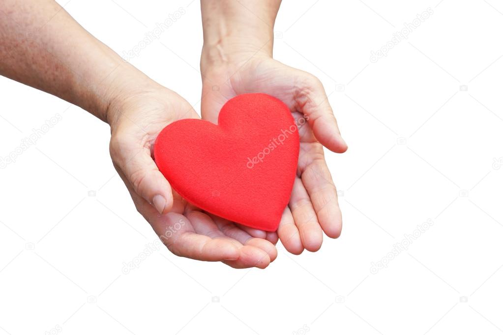 female holding red heart