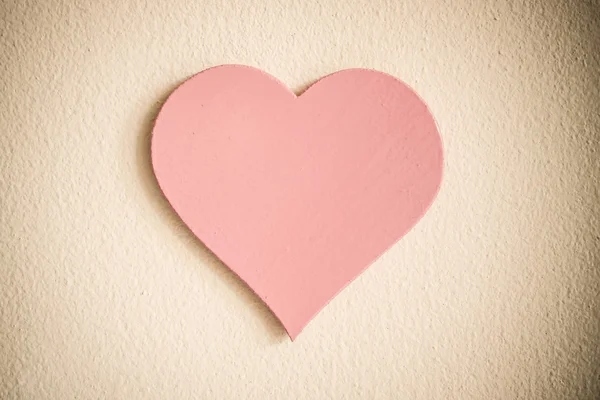 Corazón rosa en la pared — Foto de Stock
