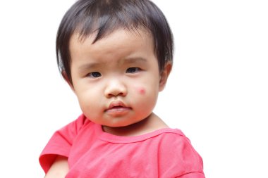 Büyük bir kırmızı nokta ile Asya bebek