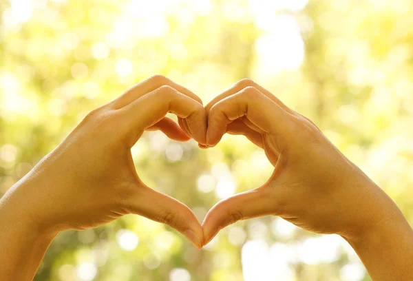Hands forming a heart shape — Stock Photo, Image
