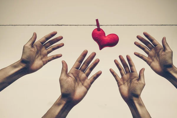 Red heart hung on a rope — Stock Photo, Image