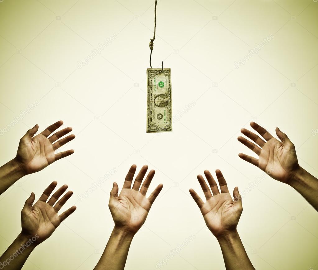 hands trying to get a dollar