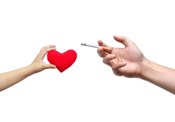 Pointing a cigarette into a red heart — Stock Photo, Image