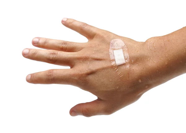 Plaster on wet hand — Stock Photo, Image