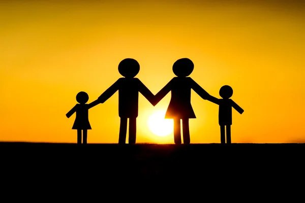 Paper cut of family and with sunset background — Stock Photo, Image
