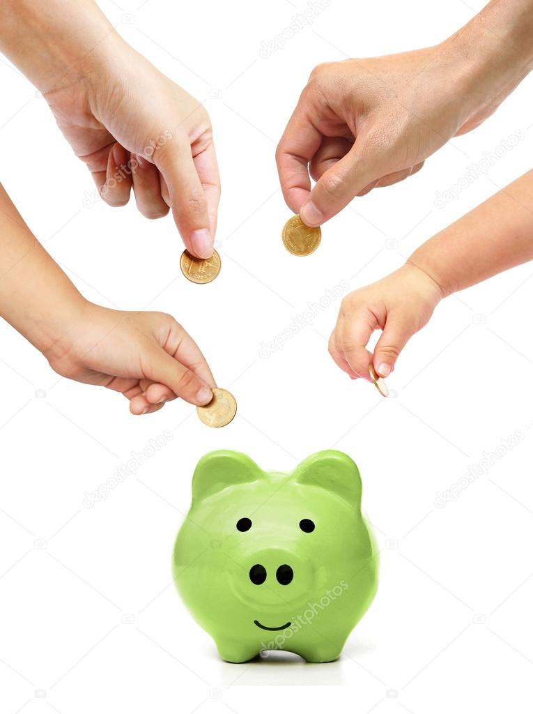People in the family doing saving money in a pink piggybank